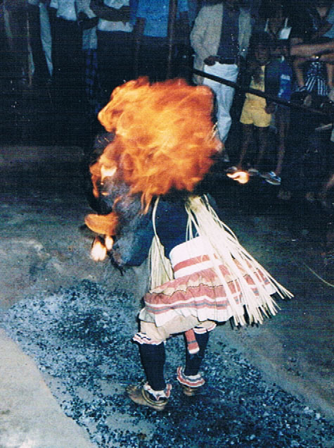 Tilak performing traditional fire dance in Kandy, Sri Lanka